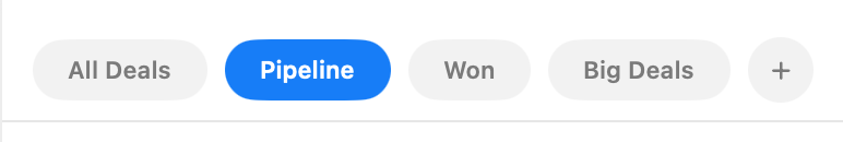 The preset tab strip above a table, with the active preset filled in blue and a + button to add another